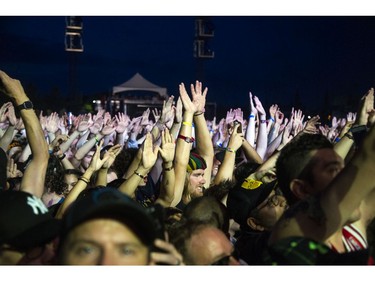 Fans cheered as Wu-Tang hit the City Stage after a delay due to weather at Bluesfest, Saturday, July 13, 2019.