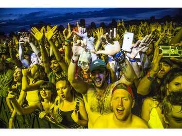 Fans cheered as Wu-Tang hit the City Stage after a delay due to weather at Bluesfest, Saturday, July 13, 2019.