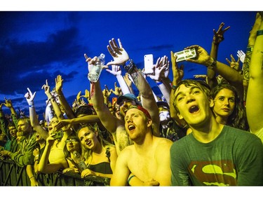 Fans cheered as Wu-Tang hit the City Stage after a delay due to weather at Bluesfest, Saturday, July 13, 2019.