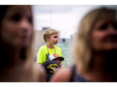 A young fan watches K'Naan during Bluesfest, Saturday, July 13, 2019.