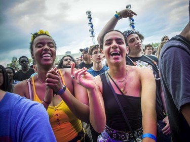 Fans cheer on K'Naan during Bluesfest, Saturday, July 13, 2019.