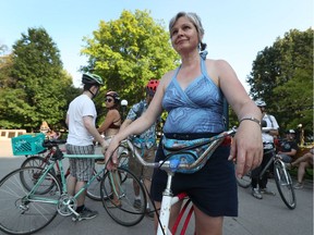 Marnie Wellar gets ready for the Critical Mass Ottawa family-friendly group bike ride through downtown Ottawa on Friday.