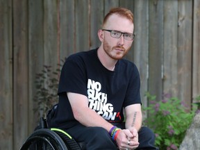 Kyle Humphrey poses for a photo outside his home in Ottawa Tuesday July 2, 2019. Kyle is the subject of a Para story. He uses a wheelchair to get around town and is a Para customer who wants the city to be better at serving people with accessible needs. Tony Caldwell