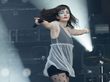 Lauren Mayberry of Chvrches performs on the City Stage as the 25th anniversary edition of RBC Bluesfest gets underway on the grounds of the Canadian War Museum in Lebreton Flats. Photo by Wayne Cuddington/ Postmedia