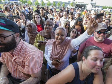 Fans of singer Nao cheer as the 25th anniversary edition of RBC Bluesfest gets underway on the grounds of the Canadian War Museum in Lebreton Flats. Photo by Wayne Cuddington/ Postmedia