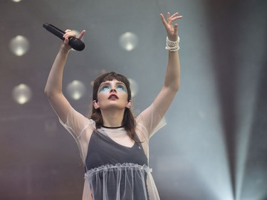 Lauren Mayberry of Chvrches performs on the City Stage as the 25th anniversary edition of RBC Bluesfest gets underway on the grounds of the Canadian War Museum in Lebreton Flats. Photo by Wayne Cuddington/ Postmedia