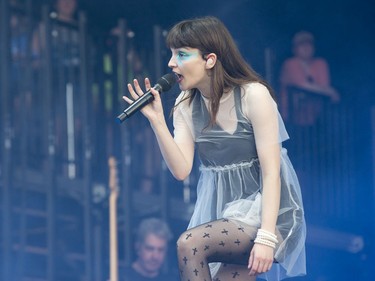 Lauren Mayberry of Chvrches performs on the City Stage as the 25th anniversary edition of RBC Bluesfest gets underway on the grounds of the Canadian War Museum in Lebreton Flats. Photo by Wayne Cuddington/ Postmedia