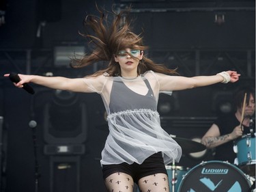 Lauren Mayberry of Chvrches performs on the City Stage as the 25th anniversary edition of RBC Bluesfest gets underway on the grounds of the Canadian War Museum in Lebreton Flats. Photo by Wayne Cuddington/ Postmedia