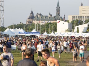 The crowds roll in as the 25th anniversary edition of RBC Bluesfest gets underway on the grounds of the Canadian War Museum in Lebreton Flats. Wayne Cuddington/ Postmedia