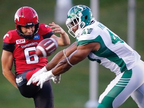 Files: Calgary Stampeders Rob Maver has his punt blocked by  Jeff Knox Jr. of the Saskatchewan Roughriders . Knox has been signed by the Ottawa Redblacks