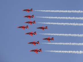 The Red Arrows feature a large nine-plane team of BAE Systems Hawk jets.