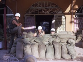 Lieutenant Pierre Leblanc (left) and his soldiers occupy a post outside the fortified Ledra Palace during peacekeeping operations in Cyprus.