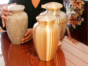 What is the 'greenest' way to deal with a body?

cnd-0823-funeral. Funeral director Laura-Lee Parris displays some fo the urns at a funeral home in Dartmouth, N.S. With story by Sarah Regan for CanWest Computer and Workplace Package. (Photo by Halifax Daily News)