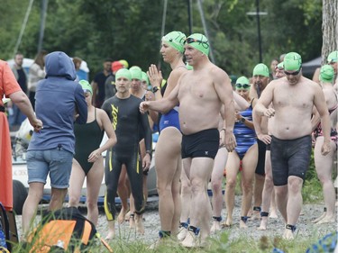 Swimmers wait for the start of the Ottawa River Riverkeeper swim on Saturday, August 10, 2019.