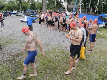 Swimmers arrive at the start of the Ottawa River Riverkeeper swim on Saturday, August 10, 2019.