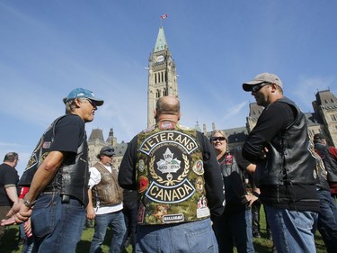 Veterans visit Parliament Hill as part of "The Rolling Barrage" charity motorcycle ride on Sunday, August 11, 2019.