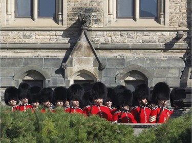 The ceremonial guard takes part in a ceremony on Parliament Hill with "The Rolling Barrage" charity motorcycle ride on Sunday, August 11, 2019.