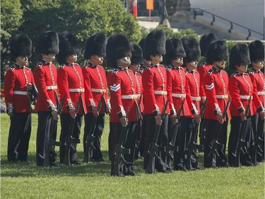 The ceremonial guard takes part in a ceremony on Parliament Hill with "The Rolling Barrage" charity motorcycle ride on Sunday, August 11, 2019.