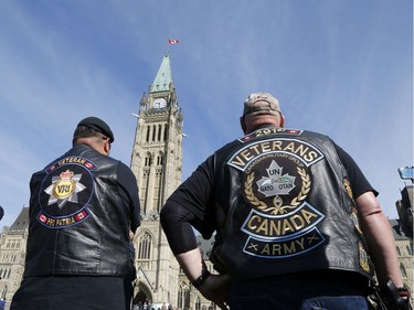 Veterans visit Parliament Hill as part of "The Rolling Barrage" charity motorcycle ride on Sunday, August 11, 2019.