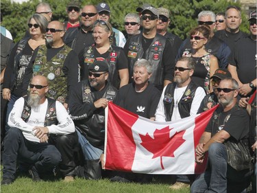 Veterans visit Parliament Hill as part of "The Rolling Barrage" charity motorcycle ride on Sunday, August 11, 2019.