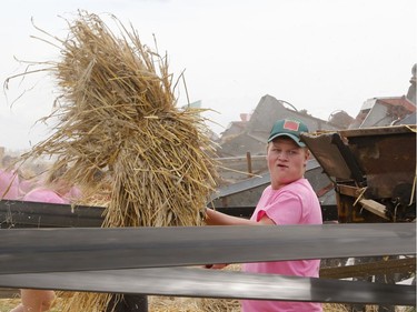 250 threshing machines attempt to break the world record by operating simultaneously on the same site in St. Albert on Sunday, August 11, 2019.