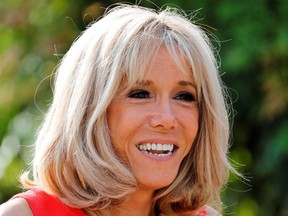Wife of French President Brigitte Macron welcomes with G7 World leaders' spouses for a visit on traditional Basque culture in Espelette, near Biarritz, as part of the G7 summit, on August 25, 2019. (Photo by Thomas SAMSON / AFP) (Photo credit should read ) ORG XMIT: 775393727