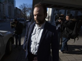 Joshua Boyle leaves the Ottawa court house in Ottawa, Ontario, on March 27, 2019.