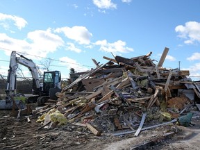 This file photo shows the remains of a house in Dunrobin that was damaged by last September's tornadoes,