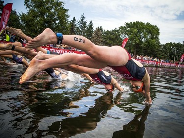 Rachel Faulds and the other Pro Women start the Enduro Race with a dive into the Rideau Canal on Saturday.