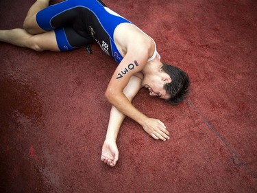 Cédric Beaulieu crumples to the ground after finishing the Youth and Junior Boys Enduro Race.