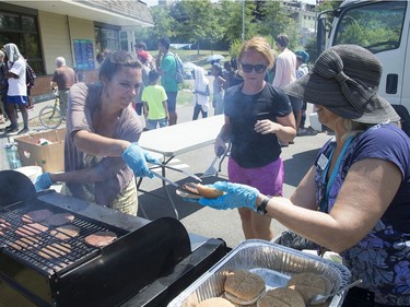 Hambergers and hotdogs are cooked up as the Ottawa Senators Foundation held a picnic at Jules Morin Park.