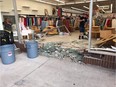 Clean-up operations are under way after a car reversed through the front facade of the Fabricland store on Walkley and Albion Roads on Friday evening.