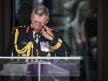 General Jonathan Vance, Chief of Defence Staff, wipes his eye during a heartfelt speech Saturday.