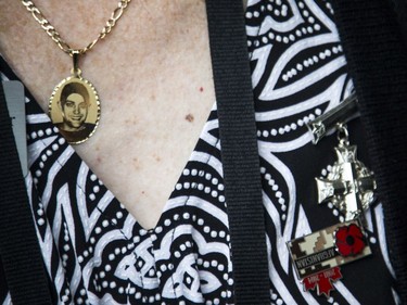 Theresa Charbonneau, mother of the late Cpl Andrew Paul Grenon, wears his photo around her neck so he is always close to her heart.