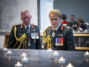 General Jonathan Vance, Chief of Defence Staff, and Governor General Julie Payette take a tour through the Afghanistan Memorial Hall.