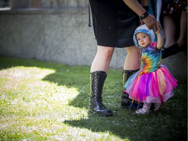The Ottawa Dyke March 2019 took place on Saturday starting at the Canadian Tribute to Human Rights on Elgin. One-year-old Morgen Steinwand gets a helping hand from one of her mothers Saturday.