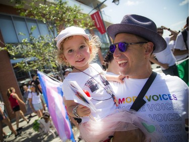 There was a huge turn out for the Capital Pride Parade on Sunday. Harley Finkelstein, COO of Shopify, with his daughter Bayley during the parade Sunday.