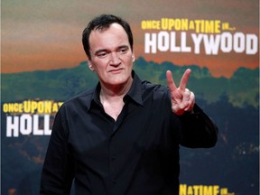 Quentin Tarantino poses during a photocall ahead of the German Premiere of his latest film "Once Upon A Time In Hollywood" in Berlin on August 1, 2019.