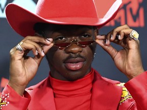 (FILES) In this file photo taken on August 26, 2019 US rapper Lil Nas X poses in the press room during the 2019 MTV Video Music Awards at the Prudential Center in Newark, New Jersey on August 26, 2019. -