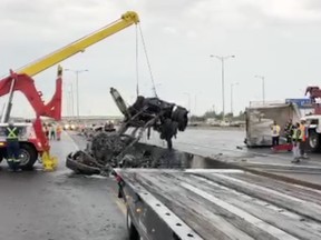 A screenshot of a video showing the cleanup of the accident.