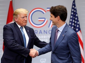 U.S. President Donald Trump and Canada's Prime Minister Justin Trudeau shake hands as they hold a bilateral meeting during the G7 summit in Biarritz, France, August 25, 2019.