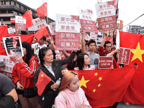 Pro-China counter-protesters rally in Vancouver on Aug. 17, 2019.