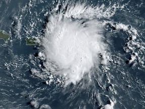 This satellite image obtained from NOAA/RAMMB, shows Tropical Storm Dorian as it approaches Puerto Rico in the Caribbean on Aug. 28, 2019.