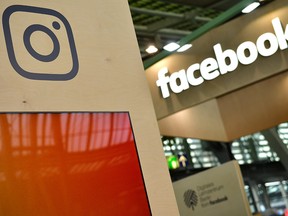The Instagram and Facebook logos are displayed at the 2018 CeBIT technology trade fair on June 12, 2018 in Hanover, Germany.