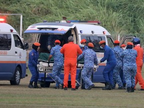 A body believed to be 15-year-old Irish girl Nora Anne Quoirin who went missing is brought into a ambulance in Seremban, Malaysia, August 13, 2019.