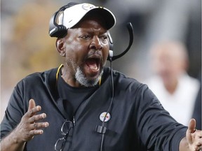In this photo from Friday, Aug. 9, 2019, Pittsburgh Steelers wide receivers coach Darryl Drake talks to a receiver during the second half of an NFL preseason football game against the Tampa Bay Buccaneers in Pittsburgh. The team said Drake, who joined the coaching staff in 2018, died early Sunday morning, Aug. 12, 2019.