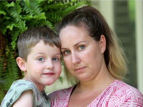 Mandy Green and her son Chase pose for a photo outside their Kemptville home Wednesday July 31, 2019. Chase, was sent home from a doctor's office and Kemptville hospital despite suffering from second stage Lyme Disease and bacterial meningitis. He was eventually diagnosed at CHEO. She's warning parents and doctors to keep Lyme Disease top of mind when assessing a child's sudden health decline. Tony Caldwell