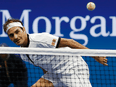 Roger Federer of Switzerland watches a shot against Damir Dzumhur of Bosnia and Herzegovina on day three of the 2019 U.S. Open, Aug. 27, 2019.