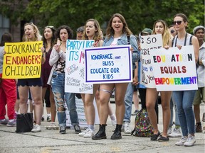 File photo/ Rally in support of keeping the updated 2015 sex ed curriculum in Ontario schools held in front of Queen's Park in Toronto, Ont.  on Saturday July 21, 2018.