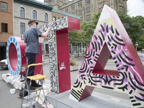 Students from the Ottawa School of Art have been tasked with painting the Ottawa sign in the Byward Market for a makeover as it nears the end of its three year lifecycle.